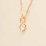Close up of the Elegant Wishes rose gold crystal pendant and fine chain
