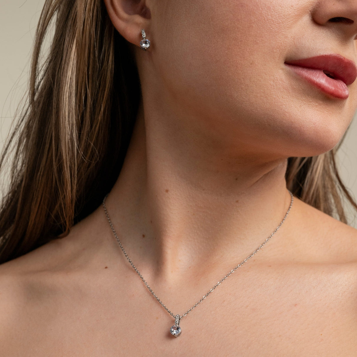 Elegant Wishes silver crystal necklace worn at the collarbone