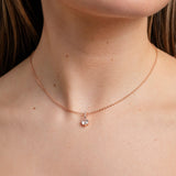 Bride wearing the Elegant Wishes rose gold crystal necklace